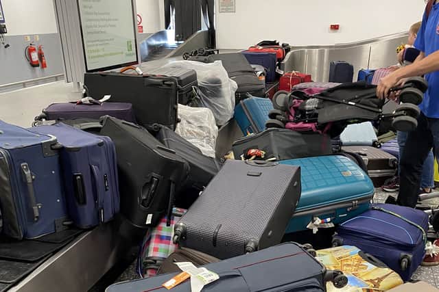 Passengers bags were dumped in a huge pile at Bristol Airport on Friday (June 18)