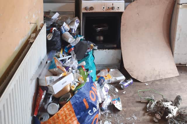 Police carrying out a warrant under the Misuse of Drugs Act found that the property was littered with used syringes and rubbish inside and out.