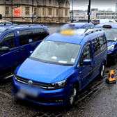 Taxis at Bristol Temple Meads railway station.