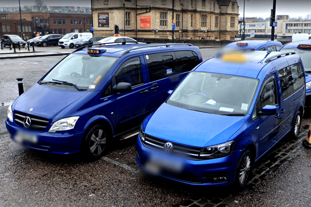 Taxis at Bristol Temple Meads railway station.