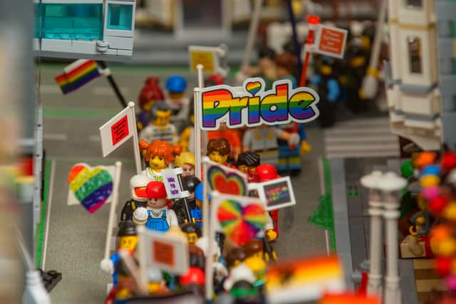The Lego version of Pride comes with its own little marching figures.