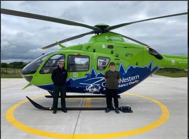 <p>Logan and Specialist Paramedic, Fleur, at the Great Western Ambulance Charity’s air base. (Photo by Great Western Ambulance Charity)</p>