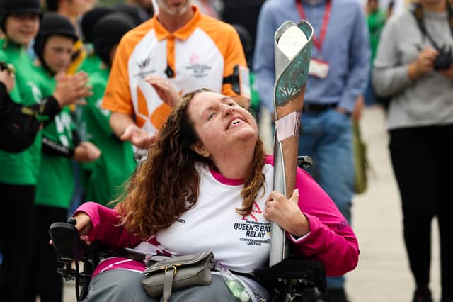 Founder of Bristol wheelchair Boccia club, Georgina Moore, handed the baton over to The Wave founder Nick Hounsfield. Pictures by Tom Wren. 