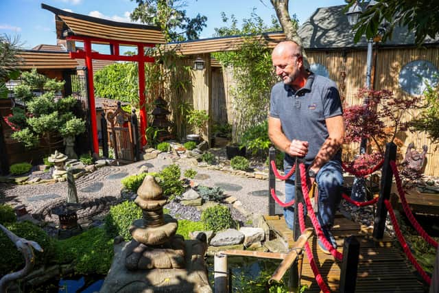 Martin Fitton from Brislington has spent 13 years transforming his backyard into a tranquil Japanese garden complete with traditional tea house and concrete lanterns