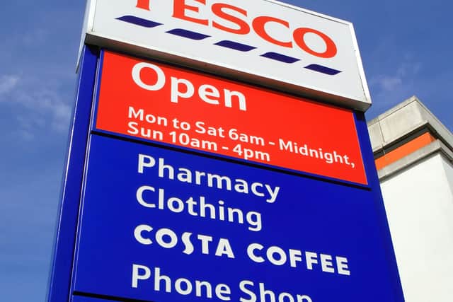 London, UK, June 14, 2011 : Tesco logo advertising sign at its retail business supermarket service station garage
