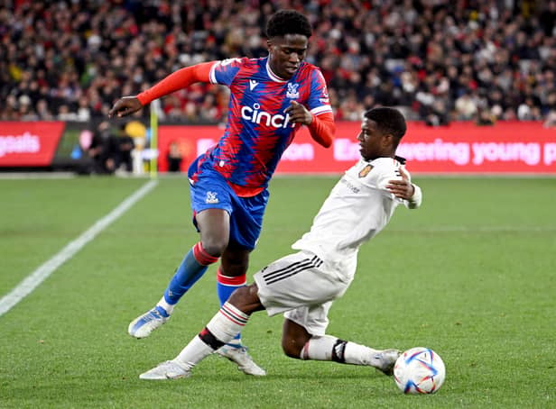 <p> Malcolm Ebiowei (L) is tackled by Manchester United player Luke Shaw during the pre-season  (Photo by WILLIAM WEST/AFP via Getty Images)</p>