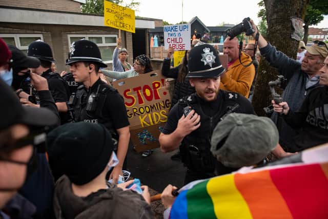Police at the protest at Henleaze Library
