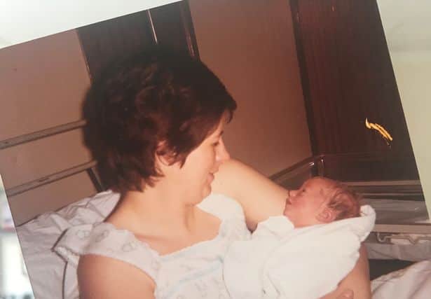 Barbara Palmer holding Lauren Palmer on the day she was born