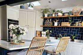 The DIY duo laid all the tiles themselves on the fireplace, in the front room and on the splash back in the kitchen