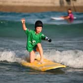  The prosthetic arm has given Joanie the confidence to surf