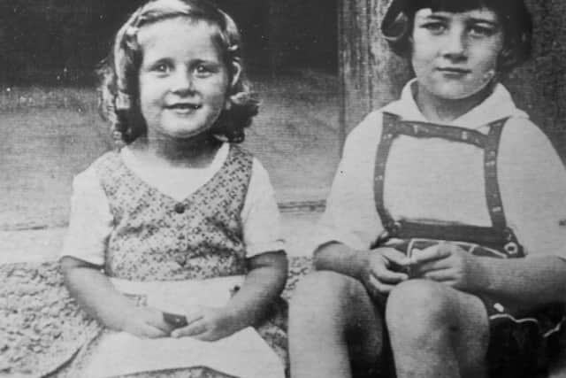 Alice Stock Frank, aged 3, with her brother Richard, aged 6