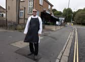 Dave John the butcher next to the double yellow lines that were painted by mistake in St Peters Rise, Headley Park.