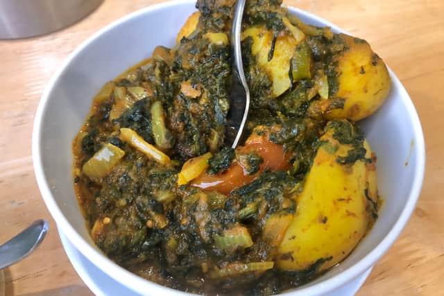 Saag aloo is one of the popular side dishes at The Curry House