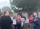 Blaise High School’s headteacher was confronted by angry parents during a protest outside the school gates.