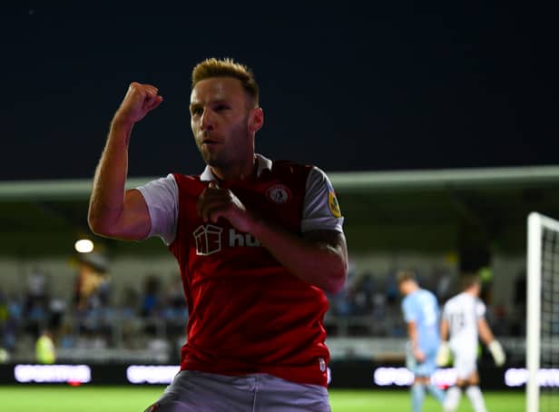 <p>Andreas Weimann of Bristol City celebrates scoring their side’s fourth goal during the Carabao Cup First Round match between Coventry City and Bristol City at Pirelli Stadium on August 10, 2022 in Burton-upon-Trent. </p>