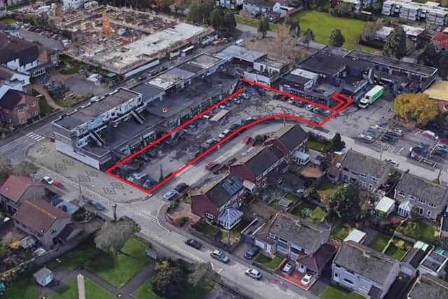 The land up for sale is behind the parade of shops facing onto Stockwood Road