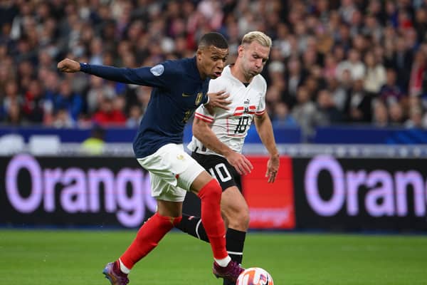 Andi Weimann battled with PSG superstar Kylian Mbappe over the international break.  (Photo by ANNE-CHRISTINE POUJOULAT/AFP via Getty Images)