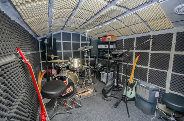 The cellar of the cottage is currently a band’s rehearsal space