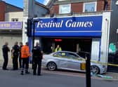 The silver BMW crashed into the arcade gaming shop, and an altercation followed (Credit: Harriet Hosker)