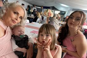 A mum of two has spoken out about her harrowing experience being trapped in a 16th floor flat with her children during a fire that killed her next-door neighbour