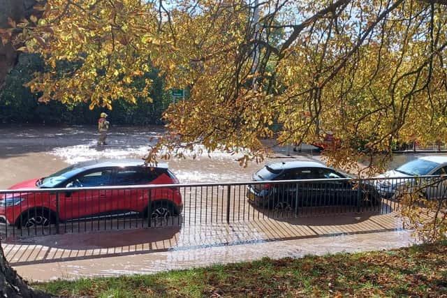 Cars caught up with the floods in Ashton this afternoon (photo: John Parkyn)