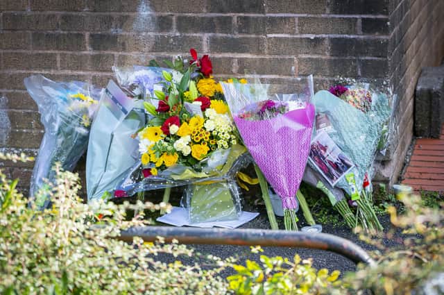 Flowers left at the scene today in Parson Paddock