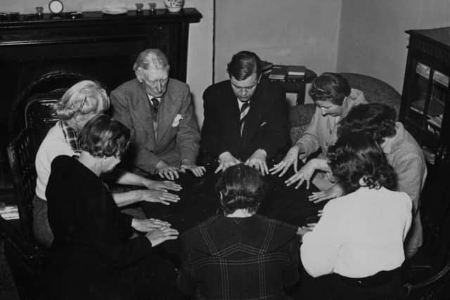 12th May 1952:  A seance at a house in Michael’s Hill, Bristol, before a treasure hunt. 