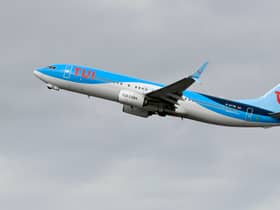 A Boeing 737-800 of the TUI airline during take-off.