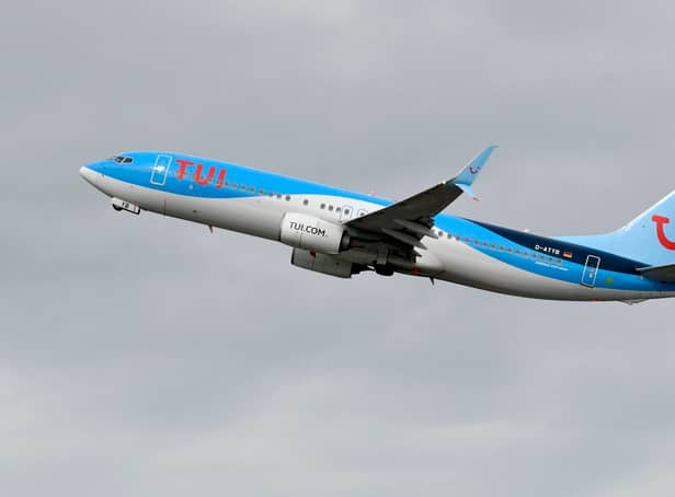 <p>A Boeing 737-800 of the TUI airline during take-off.</p>