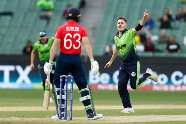 osh Little of Ireland celebrates the wicket of Jos Buttler of England during the ICC Men's T20 World Cup match between England and Ireland at Melbourne Cricket Ground