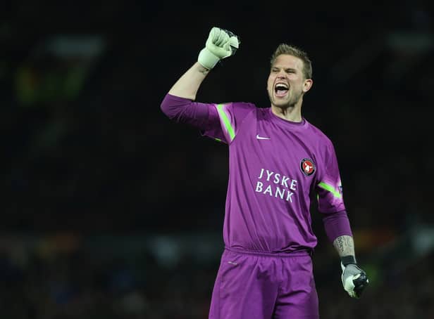 <p>Mikkel Andersen conceded six goals to Sheffield Wednesday. (Photo by John Peters/Manchester United via Getty Images)</p>