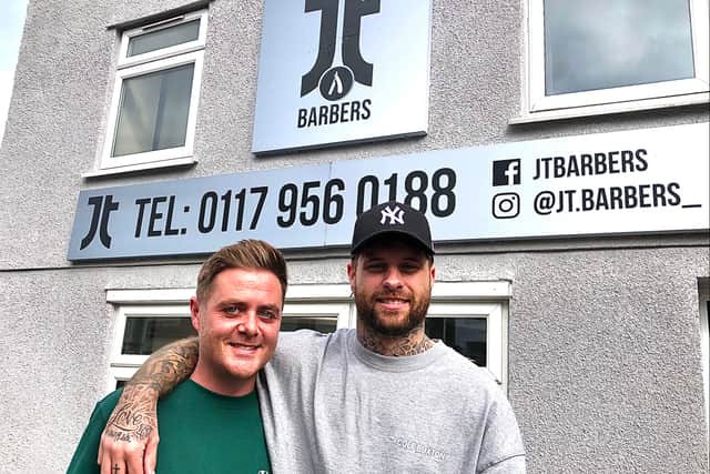Joe Tizzard and Charlie Lacey outside JT Barbers in Mangotsfield