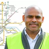 Mayor Marvin Rees with a map of the proposed underground