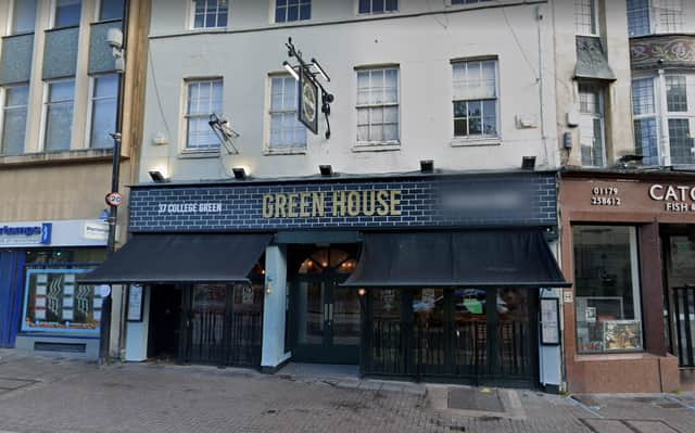 An Avon and Somerset Police officer is accused of punching a man in the face at the Green House Bar, in College Green.