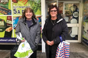 Stockwood residents Diane Bryant and Julie Brake outside the under-threat Post Office on Hollway Road