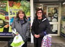 Stockwood residents Diane Bryant and Julie Brake outside the under-threat Post Office on Hollway Road