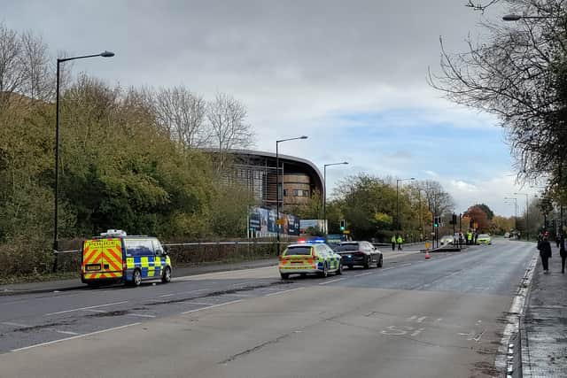 Collision investigators at the scene of a crash in Whitchurch Lane