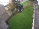 A Deliveroo rider appears to cross a woman’s front garden while on a motorbike