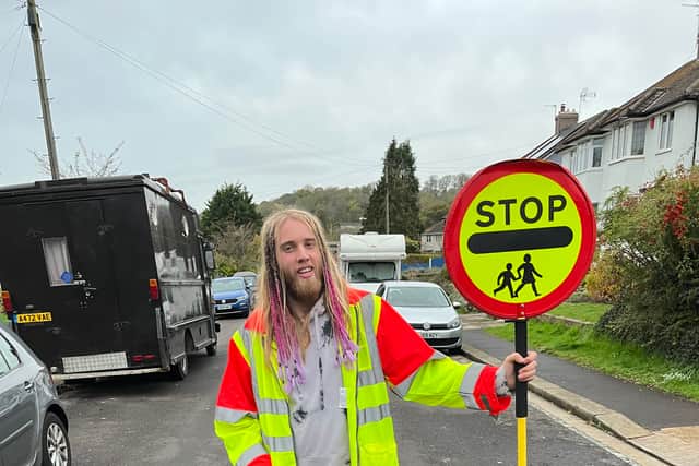 Musician Max Edkins is also the lollipop person at his former school
