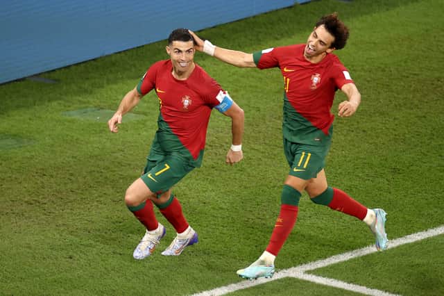Cristiano Ronaldo celebrates with Joao Felix after scoring Portugal’s first goal (Getty Images)