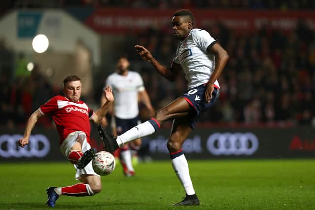 Joe Morrell with a rare outing for Bristol City, tackling Sammy Ameobi of Bolton Wanderers during the FA Cup Fourth Round match between Bristol City and Bolton Wanderers at Ashton Gate on January 25, 2019