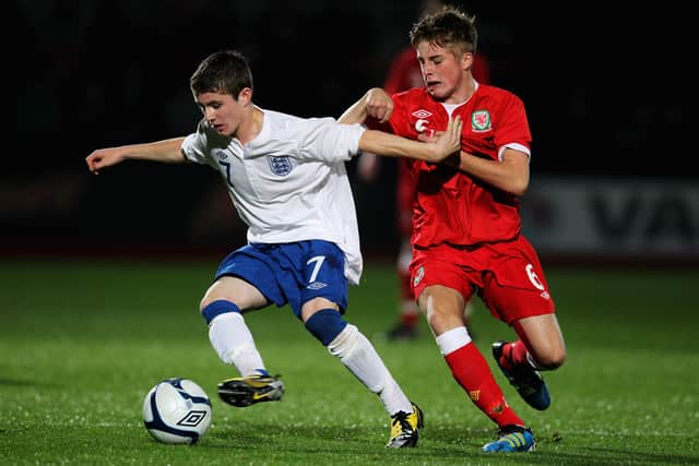 Dan Crowley of England and Joe Morrell of Wales battle for the ball during the The Sky Sports Victory Shield between England U16 and Wales U16 at The Abbey Business Stadium on October 27, 2011