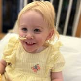A mum who took her 17-month-old daughter to the GP for a suspected ear infection  was told the toddler was ‘waiting at God’s door’ and had to be put on a heart transplant list.