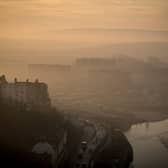 Mist lingers as the sun begins to rise over roof tops in Bristol (Photo by Matt Cardy/Getty Images) for illustrative purposes.