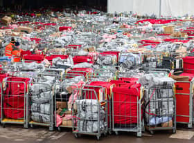 These photos taken 17 hours apart show the same heaps of post left outside a major Royal Mail centre - as fears grow strikes could ruin Christmas. Chaotic scenes of undelivered post were pictured at a mail centre in Bristol both yesterday and today.