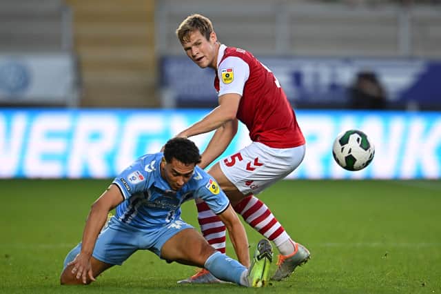 Atkinson in action against Coventry City earlier this season 