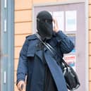 Xahra Saleem leaves Bristol Magistrates Court after facing two charges of fraud. 