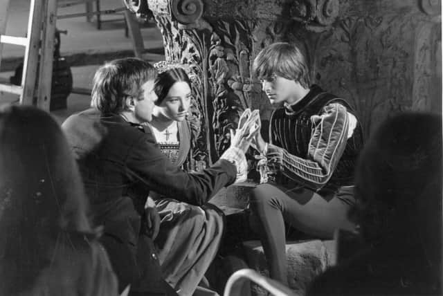 Italian stage and film director, Franco Zeffirelli with Olivia Hussey and Leonard Whiting, during the filming of 'Romeo and Juliet'.  (Photo by Express/Express/Getty Images)
