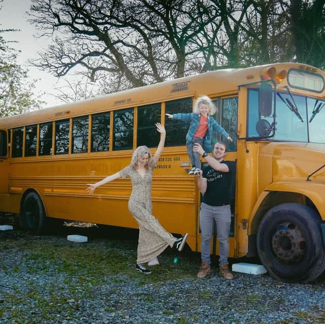The Dix family outside their converted school bus