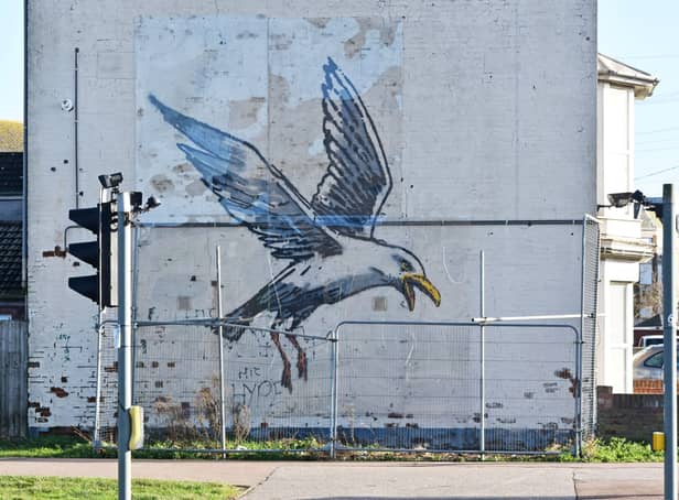 <p>The Banksy mural in in Lowestoft, Suffolk, after the skip was removed</p>